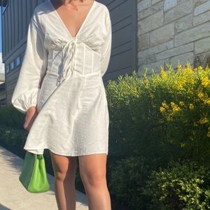 super sweet white milkmaid/corset dress. ribbed and cinches in the back.